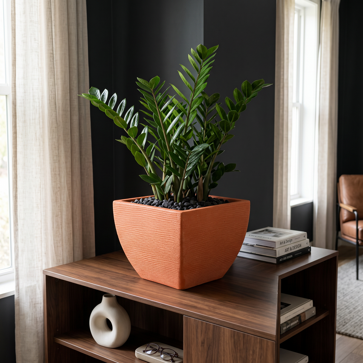 Solen Garden | Modern Lightweight Outdoor Planters LUMEN 150 square resin planter with matte orange stone texture.