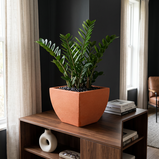 Solen Garden | Modern Lightweight Outdoor Planters LUMEN 150 square resin planter with matte orange stone texture.